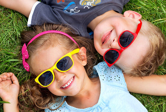 Kids with Glasses Smiling - Pediatric Dentist in Livingston, NJ